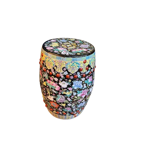 178 - Oriental floral decorated barrel stool, 48cm.