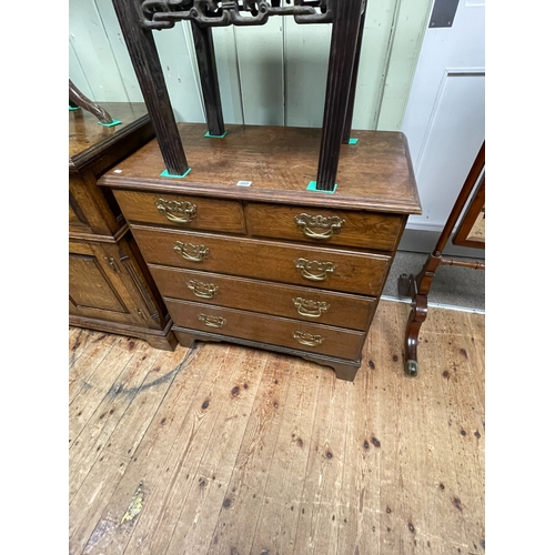 389 - Georgian oak chest of two short above three long drawers on bracket feet, 79cm by 77cm by 42cm.