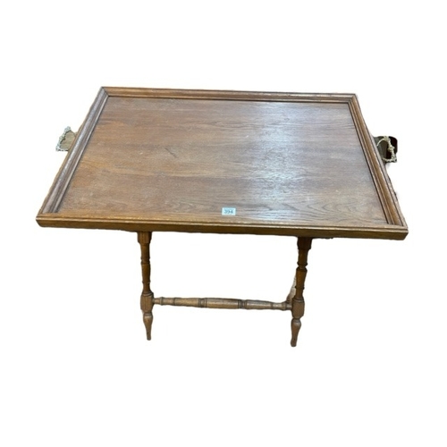 394 - Butlers tray on turned leg folding stand, 77cm by 89cm by 55cm.