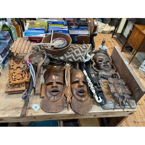 48 - Collection of African carved masks, panel, musical instruments, etc.