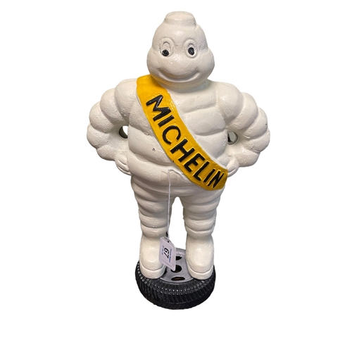 67 - Cast metal Michelin Man doorstop, 39cm.