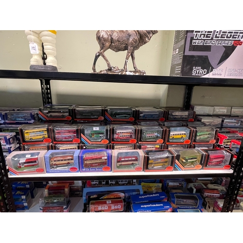 71 - Sixty three boxed mostly Gilbow exclusive first edition Omnibus 1:76 Diecast Models.