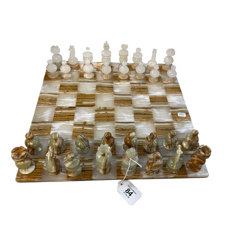 84 - Onyx chess set and board.