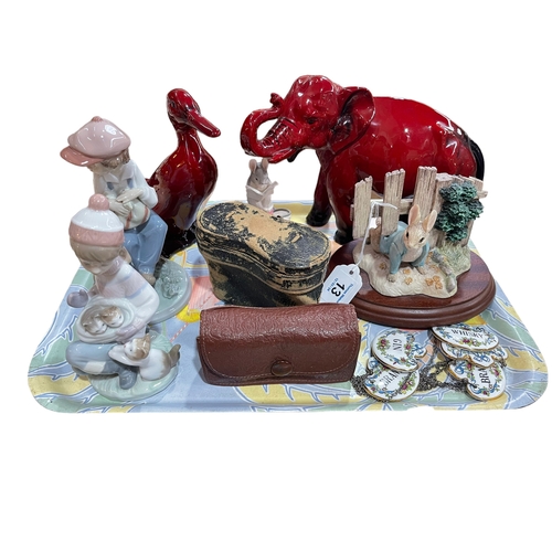 13 - Royal Doulton Flambé elephant and duck, two Lladro figures, two Beatrix Potter groups, five china de... 