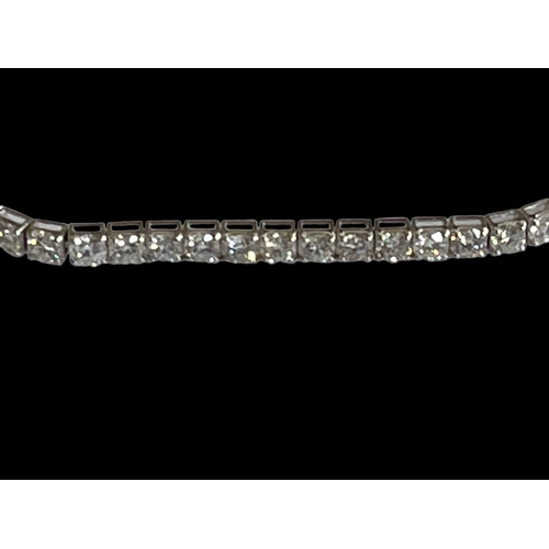 178 - 18 carat white gold and diamond tennis bracelet, 17.5cm in length, diamond content 8.06 carats.