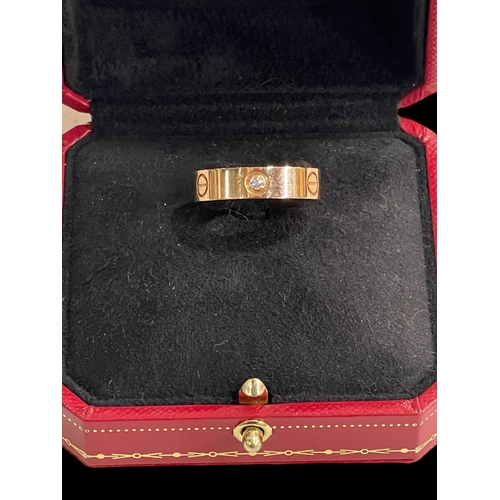 184 - Cartier 18 carat gold and diamond set band ring, signed to interior, purchase date 2015, serial numb... 