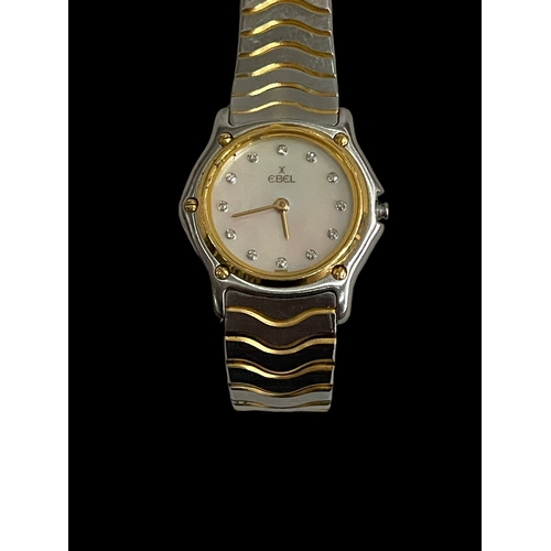 189 - Ebel ladies two tone, 18 carat gold and stainless steel, bracelet watch with diamond set mother of p... 