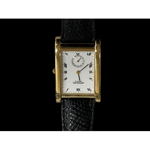 190 - Raymond Weil tank style 18 carat gold plated wristwatch with papers.