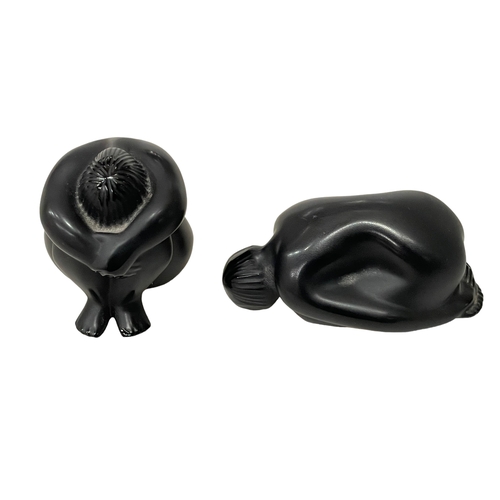 246 - Two small Lalique Nu Nahbi and Nu Reve Resting, black.