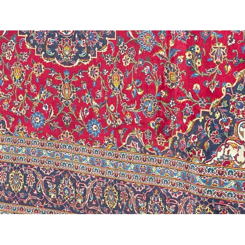 294 - Hand knotted Iranian wool carpet 3.46 by 2.57.