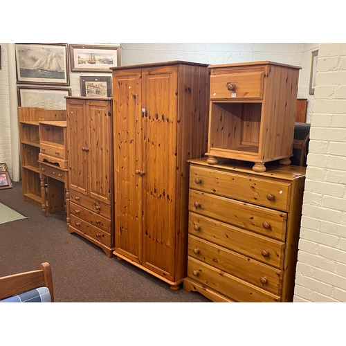 313 - Collection of pine furniture to include two wardrobes, five drawer chest, dressing table, pedestal, ... 