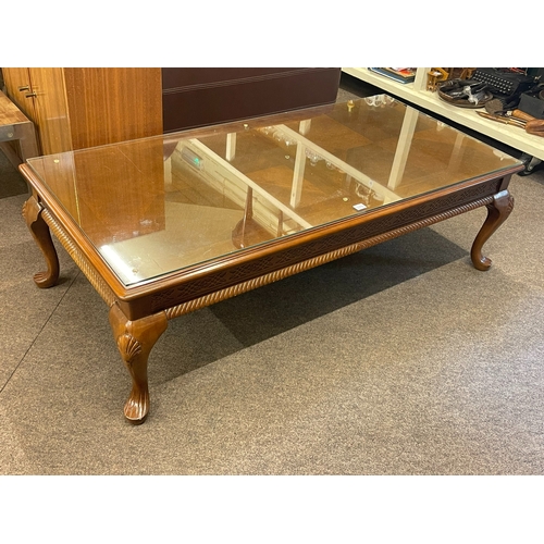 319 - Chippendale style rectangular low centre table on cabriole legs, 42cm by 138cm by 67cm.