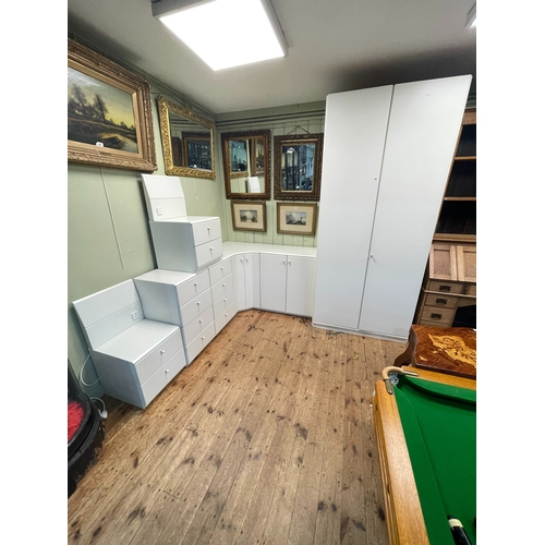 380 - Hulsta, Germany, eight piece bedroom suite comprising two door wardrobe, two door linen cupboard, co... 