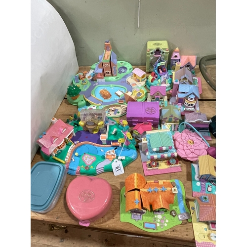 61 - Collection of Polly Pocket figures and playsets.