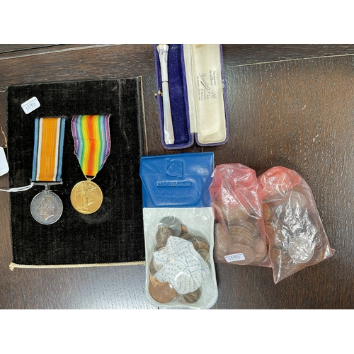 127 - Two WWI medals awarded to M. RIMMINGTON V. A. D., collection of pre 1947 coins, enamel and mother of... 