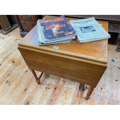 137 - Collection of Meccano in wooden cabinet.