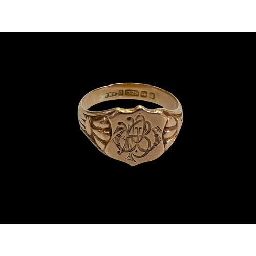 167 - 9 carat gold signet ring.