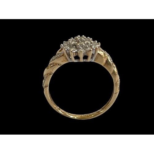 197 - Diamond cluster 9 carat gold ring, size P.