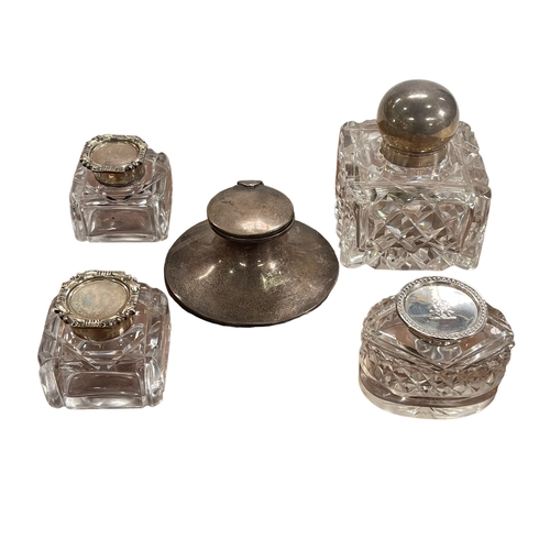 1 - Silver inkwell and four silver topped glass inkwells.