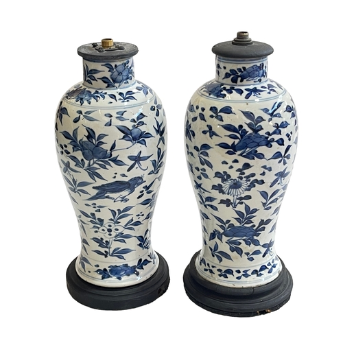 113 - Pair of Chinese blue and white lamp bases with bird and floral decoration, 30cm.