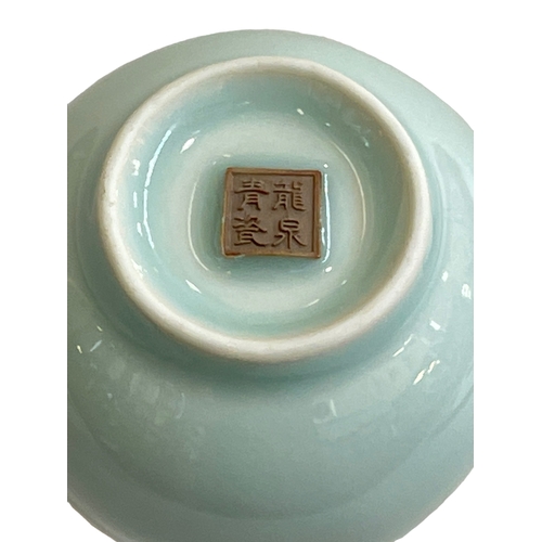 115 - Small Chinese Celadon vase with applied four character mark to base, 11cm with box.