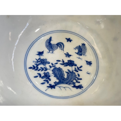 116 - Chinese blue and white porcelain bowl decorated with chickens, six character mark to base, 19cm.