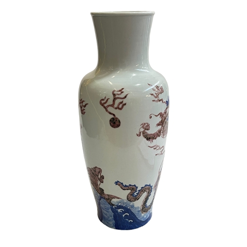 117 - Large Chinese vase decorated with dragons, six character mark to base, 41cm.