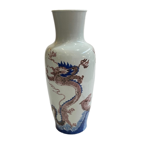 117 - Large Chinese vase decorated with dragons, six character mark to base, 41cm.