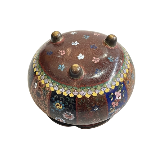 119 - 19th Century Chinese Cloisonné jardiniere raised on three bun feet with floral decoration, 13cm diam... 