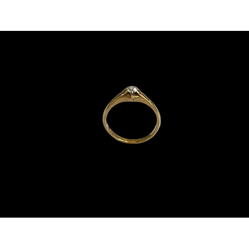 141 - Diamond solitaire 18 carat gold ring,size O/P.