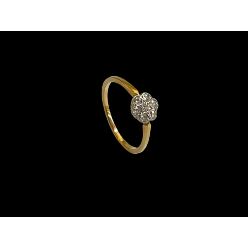 142 - Diamond seven stone 18 carat gold ring, size P.