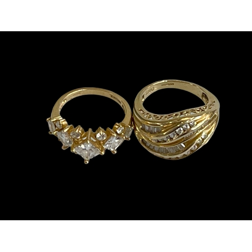 153 - Two 14k gold dress rings.