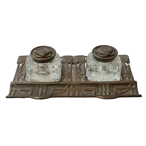 174 - Rennie Mackintosh design inkstand, reg number 519422, 25cm across.