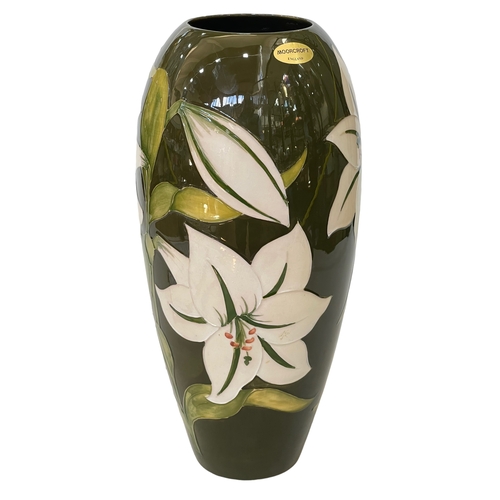 186 - Walter Moorcroft Bermuda Lily Design large vase on green ground, 37cm.