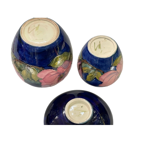 201 - Moorcroft Pottery large and medium sized ginger jars and circular bowl, all decorated with magnolia ... 