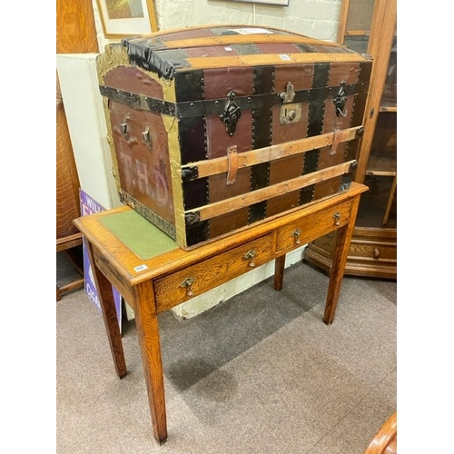 233 - Dome topped trunk, oak two drawer writing table, Victorian mahogany scroll arm rocking chair, Ligna,... 