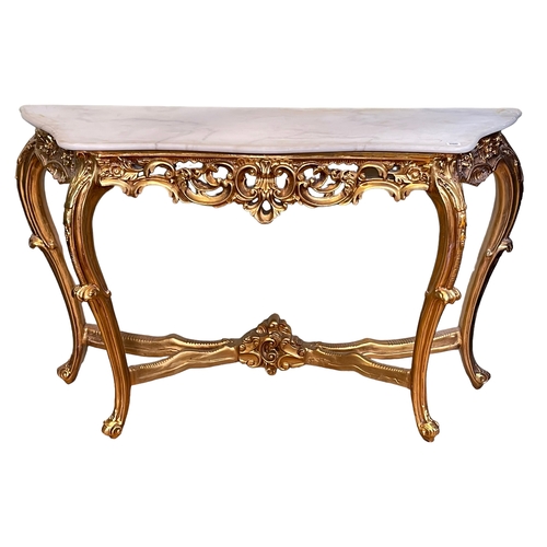 260 - Marble topped and gilt serpentine front console table, 83cm by 134cm by 40cm.