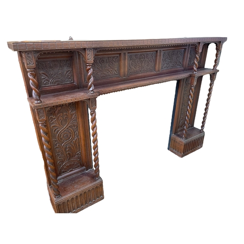 261 - Carved oak and barley twist column fire surround, 129cm by 191.5cm by 22.5cm.