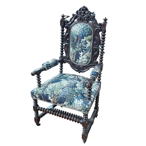 267 - Victorian carved oak and bobbin open armchair in tapestry fabric.