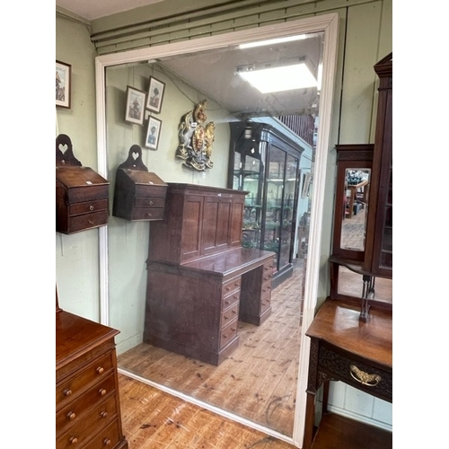 304 - Large Victorian panel back bevelled wall mirror in painted frame, 222cm by 153cm.