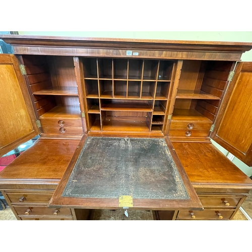 305 - Victorian mahogany pedestal desk, the upper section having fall front writing surface and two doors ... 