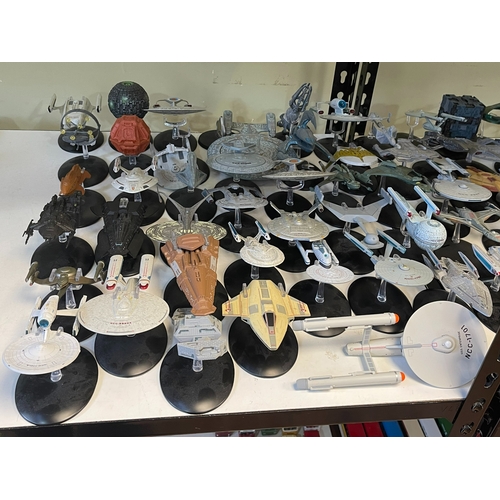 58 - Large collection of Star Trek 'Starships', Star Wars space craft, figures, etc.