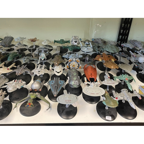 58 - Large collection of Star Trek 'Starships', Star Wars space craft, figures, etc.