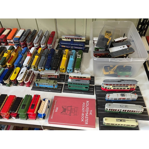 59 - Mixed collection of model buses and trams.