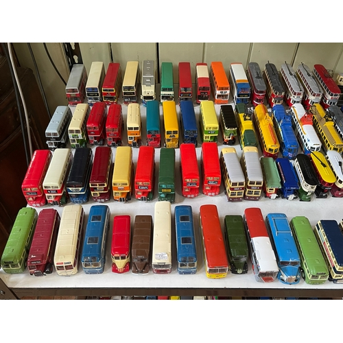 59 - Mixed collection of model buses and trams.