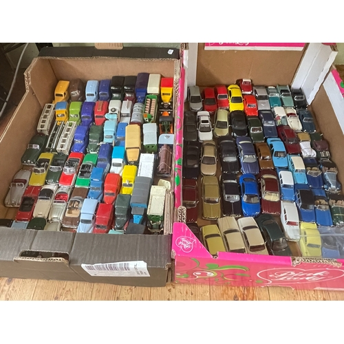 64 - Five boxes of model vehicles including Mini Collection and Assassins Creed figures.