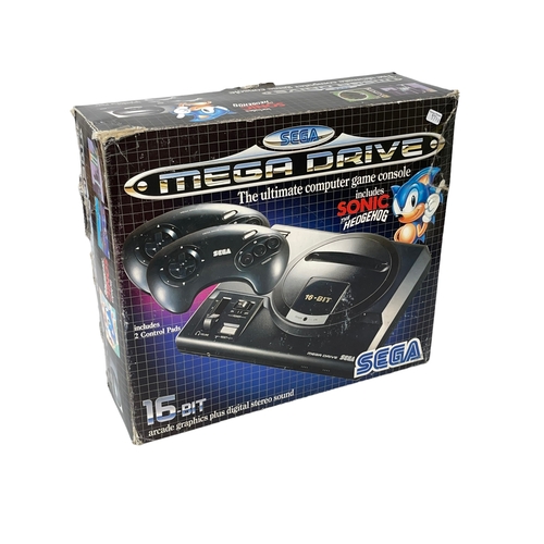 90 - Sega Mega Drive game console.