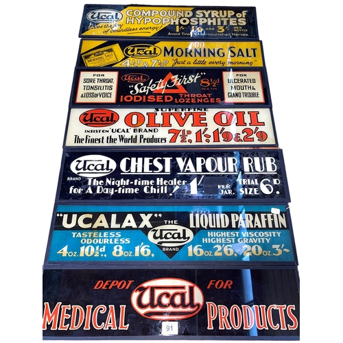 91 - Seven glass Ucal Medicinal advert signs, 54cm.