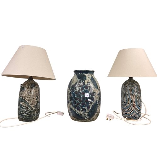 100 - Ancient Mariner lamp table, two Studio Pottery table lamps and floral decorated vase.