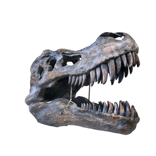 119 - Composite dinosaur skull, 37cm high.